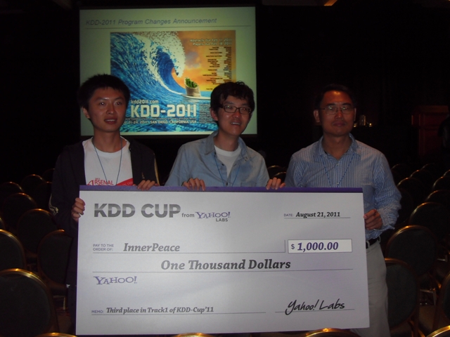 Jiang Xiao from SHJTU, Nathan Liu, and Prof Yang at the KDD-Cup 2011 Award Presentation Ceremony