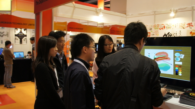 Visitors having hands-on experience in using Moxi (2)